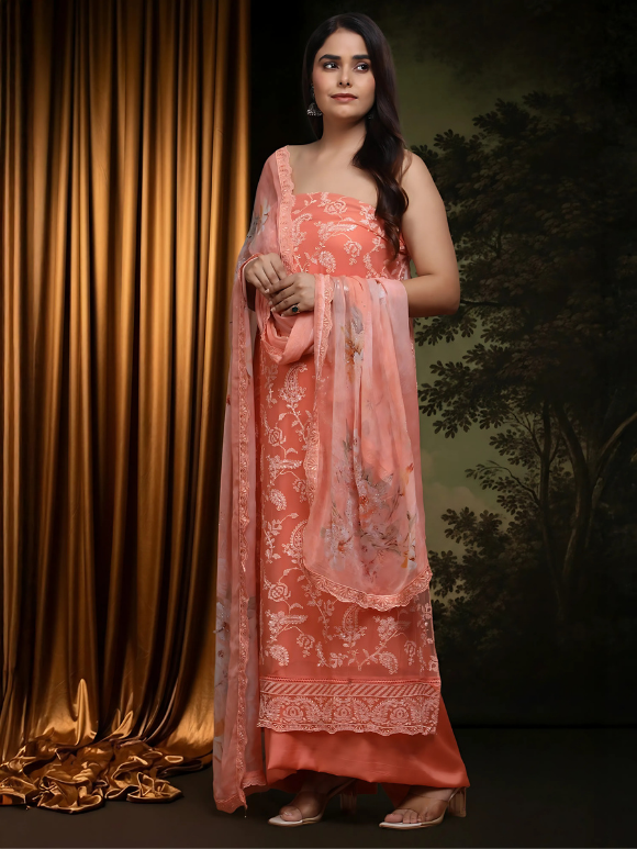 Elegant coral peach suit with delicate embroidery