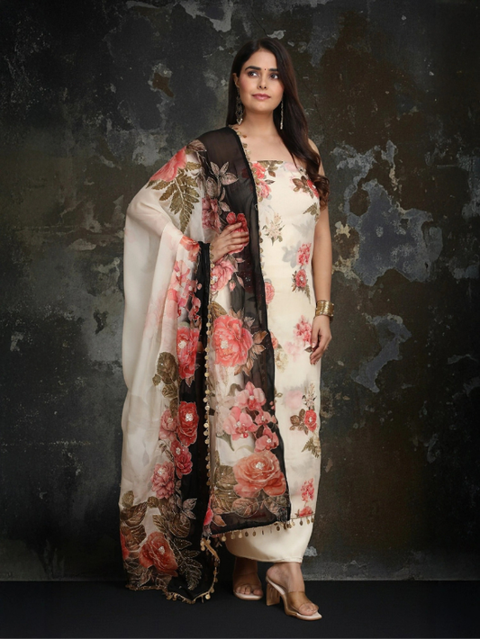 Ivory floral suit with a contrasting black dupatta