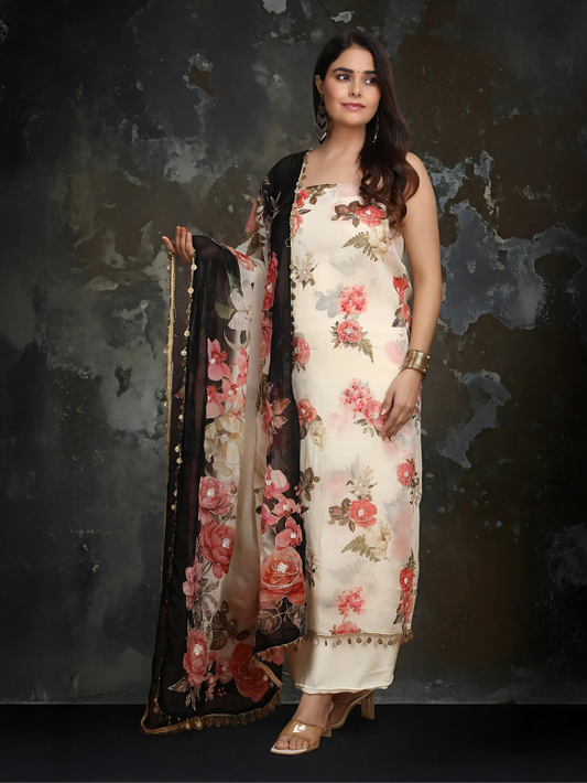 Ivory floral suit with a contrasting black dupatta