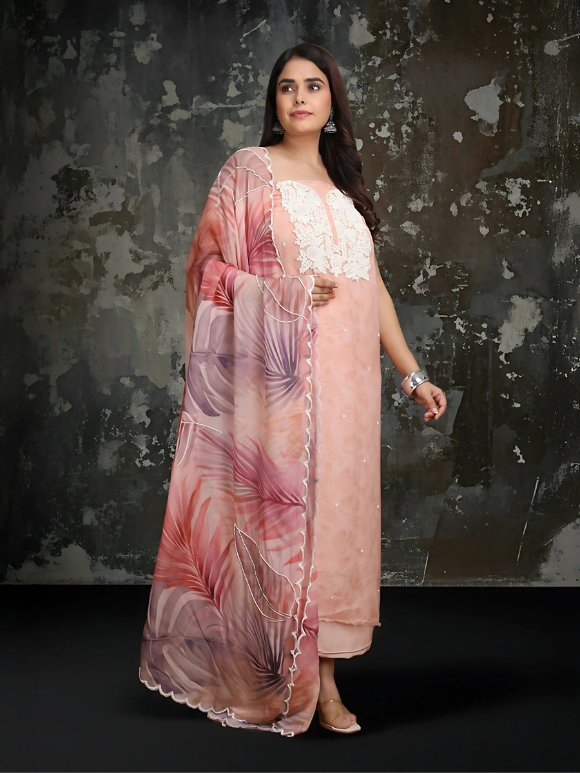 Peach ensemble with delicate embroidery and a dreamy printed dupatta