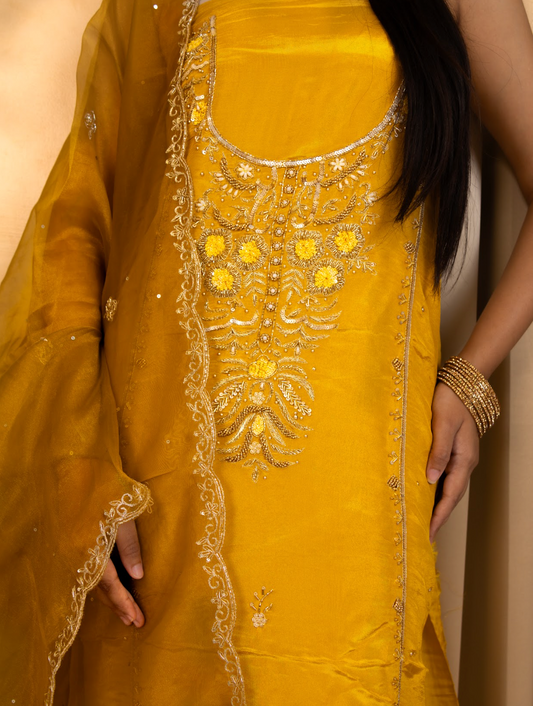 Close-up of rich opada-silk separates paired with a breezy muslin dupatta
