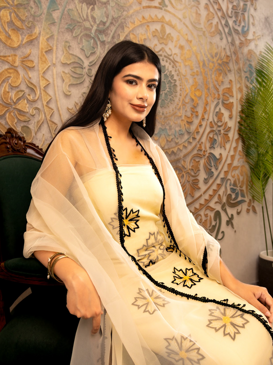 Clean crepe suit set elevated with a soft chinnon dupatta