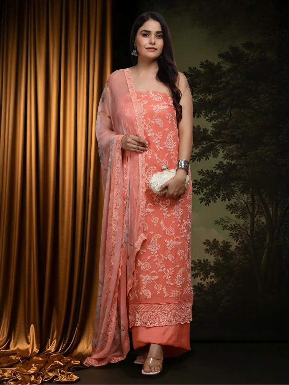 Elegant coral peach suit with delicate embroidery