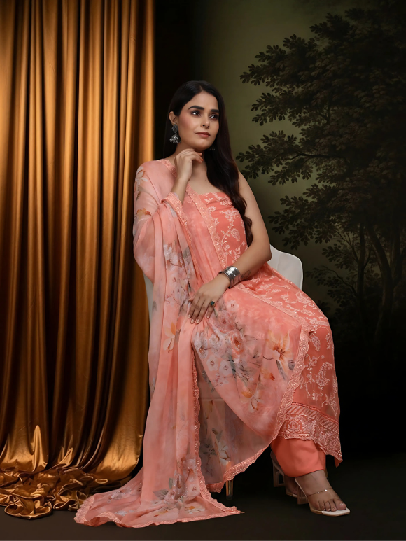 Elegant coral peach suit with delicate embroidery