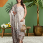 Printed suit with intricate patterns and a flowy dupatta 