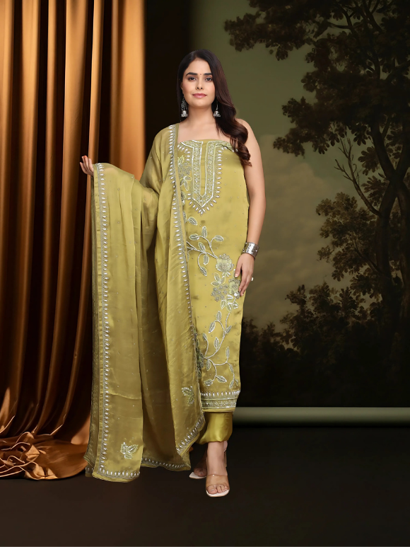 Embellished suit in mustard tones is a perfect mix of elegance and festive charm