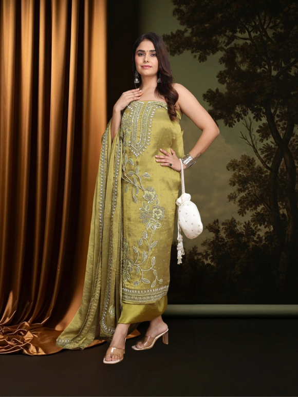 Embellished suit in mustard tones is a perfect mix of elegance and festive charm