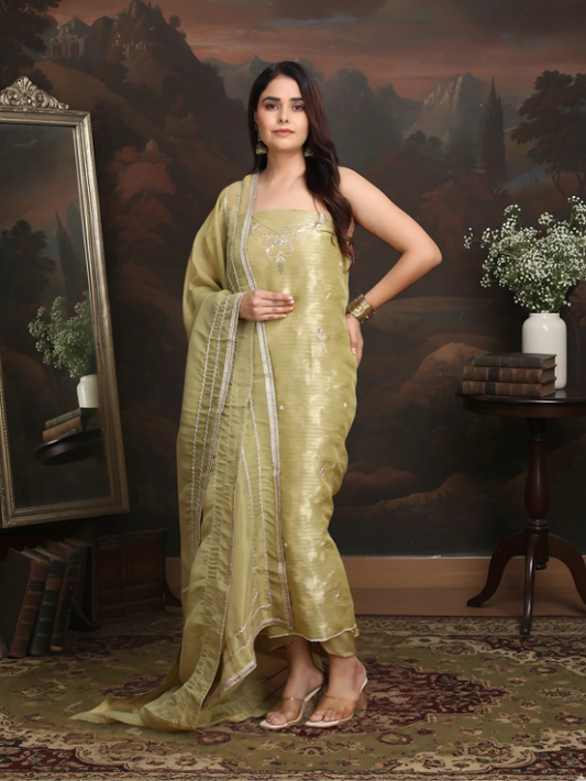  Pastel gold ensemble is crafted to reflect subtle shine and graceful charm. 