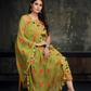 Lightweight and stylish green suit with bold floral prints
