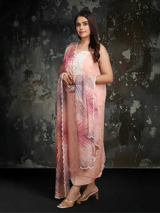 Peach ensemble with delicate embroidery and a dreamy printed dupatta