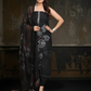 Classic black ensemble with subtle embellishments and a flowy dupatta