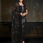 Classic black ensemble with subtle embellishments and a flowy dupatta