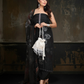Classic black ensemble with subtle embellishments and a flowy dupatta