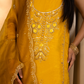 Close-up of rich opada-silk separates paired with a breezy muslin dupatta 