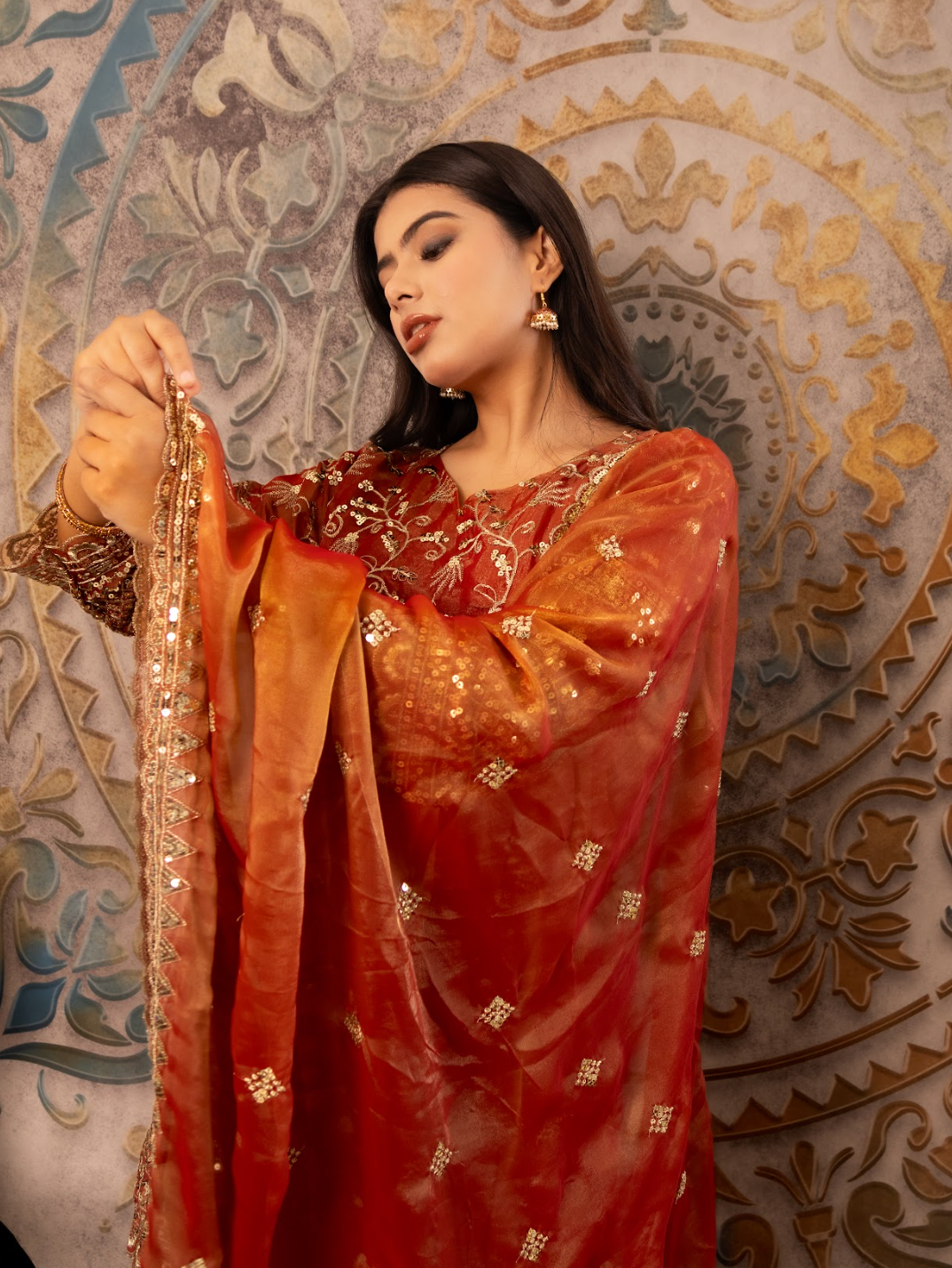 Shimmer-georgette suit crafted for festive wear